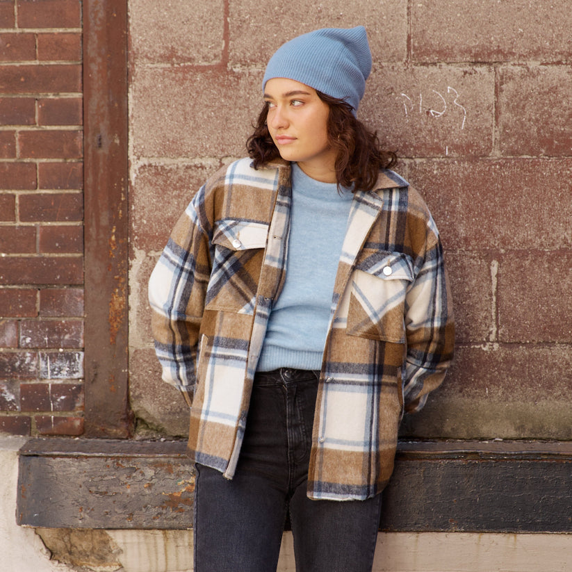 Slouchy beanie with a plaid flannel shirt